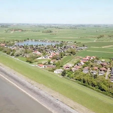 Holiday home Eckwarderhorne Deichblick: Freistehende Ferienvilla Mit Kamin *